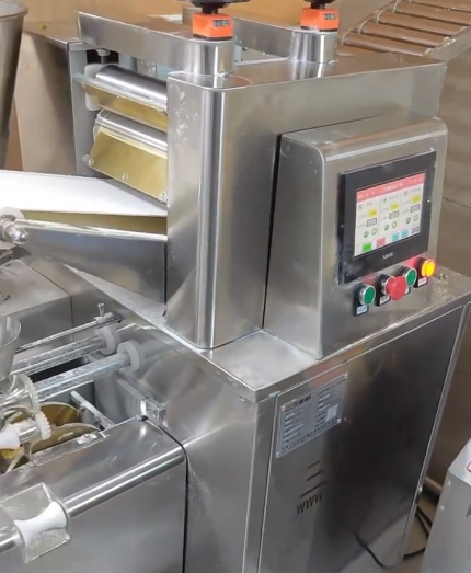 餃子機(jī)包餃子現(xiàn)場(chǎng) 餃子機(jī)包餃子現(xiàn)場(chǎng)